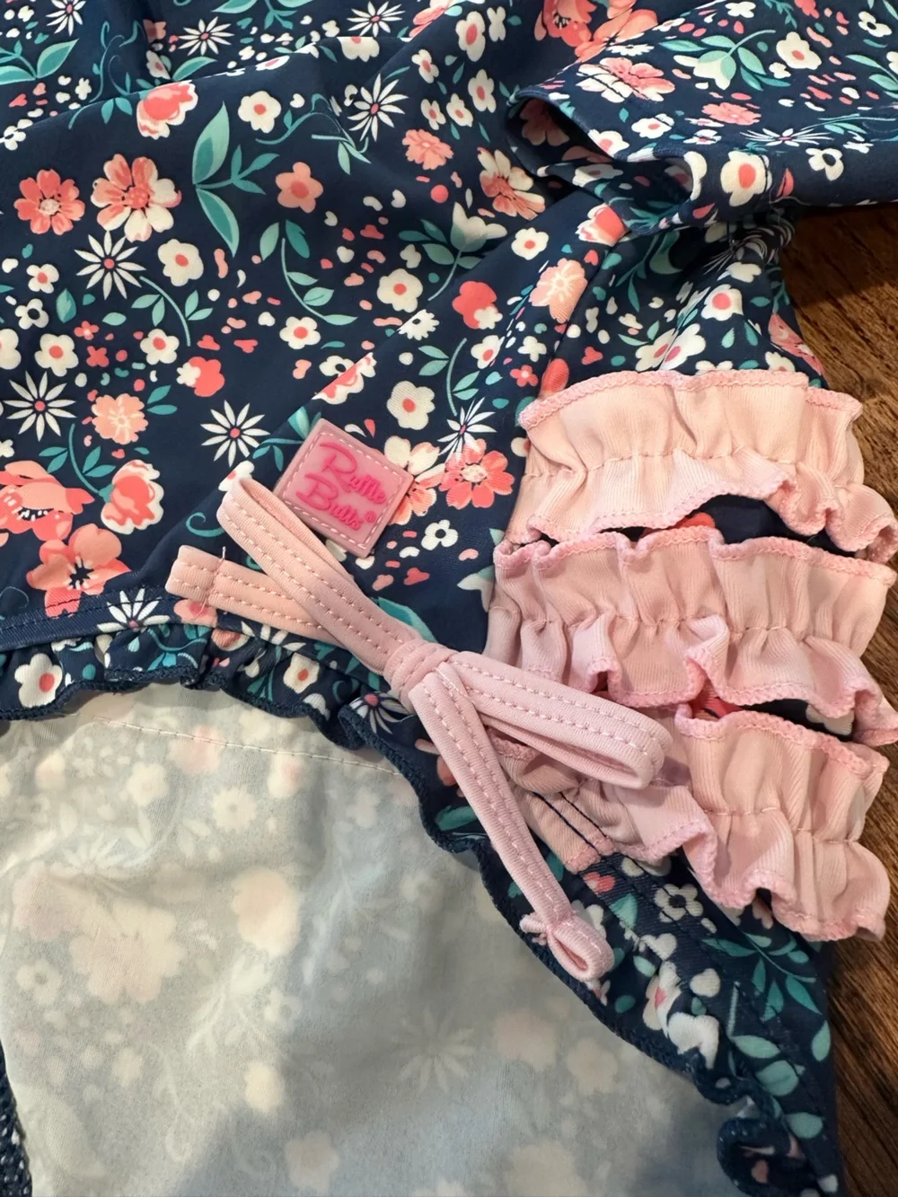 Ruffle Butts Swim - Navy Floral One-Piece 18-24M